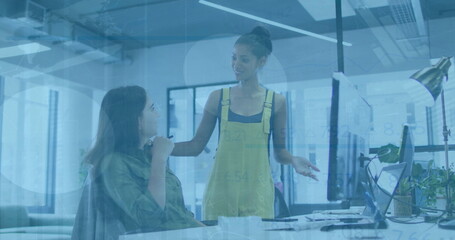 Image of financial data processing over diverse business people in office