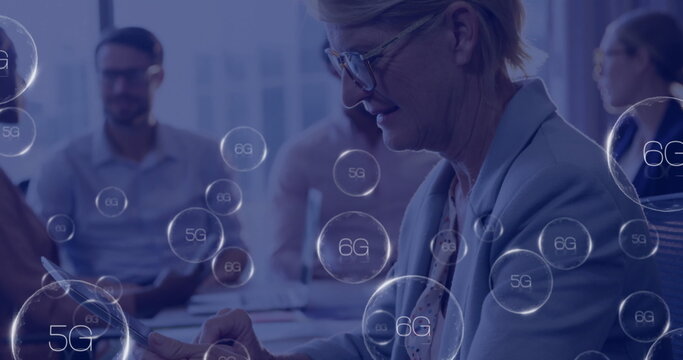 Image of 6g texts over caucasian businesswoman using tablet