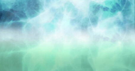 Image of white shapes moving on blue background