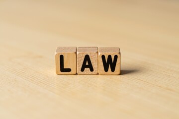 Wooden Letter Blocks Spelling Law: A Creative Visual Representation of Legal Concepts and Justice Themes for Educational and Commercial Use