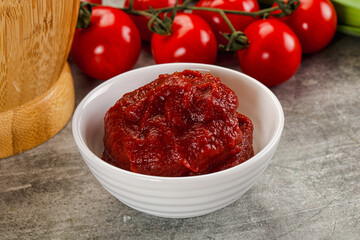 Red tomato paste in the bowl