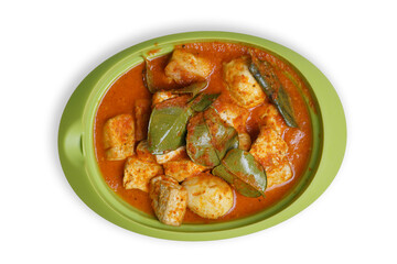 Eggs and tofu balado with spices and lime leaves. Indonesian cuisine. Focus selected