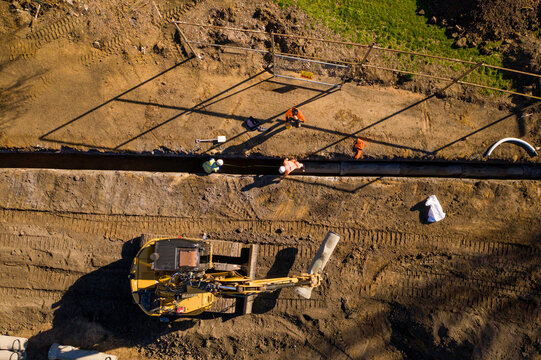Earthworks and construction on job site at development project