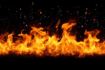 Fototapeta premium Fiery inferno flames burning intensely against a black background, with sparks and embers.