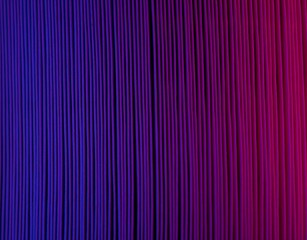 Colored light shining over the edges of paper envelopes