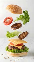 Photo of a deconstructed burger with floating ingredients sesame bun, lettuce, tomato, cheese, and patties.	