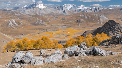 Fototapeta premium Autumnal Majesty: Panoramic View of Golden Trees and Snow-Capped Mountains