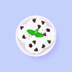 Creamy ice cream topped with chocolate chips and fresh mint leaves