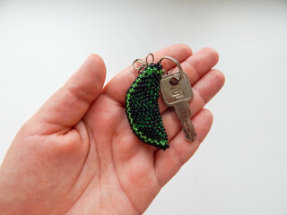 Bead colorful key chain in hand