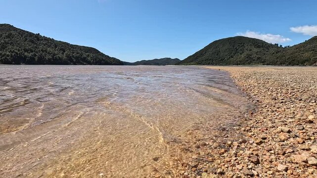Awaroa Inlet at high tide on the Abel Tasman walking track, Abel Tasman National Park. South Island , New Zealand