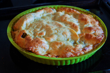 Delicious Homemade Apple Pie in Green Baking Dish