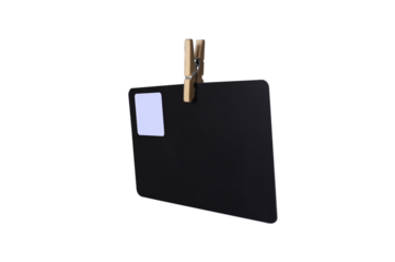 black card hanging with clips office note taking supplies are on background for text, notes or announcement.