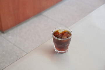 A Chilled Glass of Iced Coffee Placed on a Table Ready to Enjoy