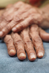 Fototapeta premium close up of hands of a elderly person 