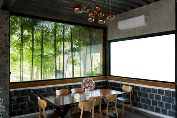 Blank poster on window glass template. Empty placard attached on window glass.