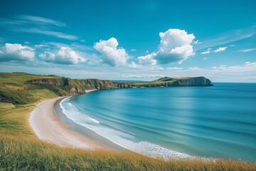 View of the beach on a cliff with beautiful grass.
