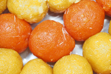 close up of indian sweet in a bowl on table.