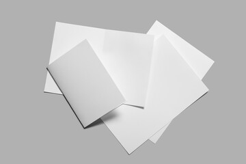 Blank brochures on grey background