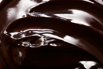 Closeup view of brown melted chocolate as background