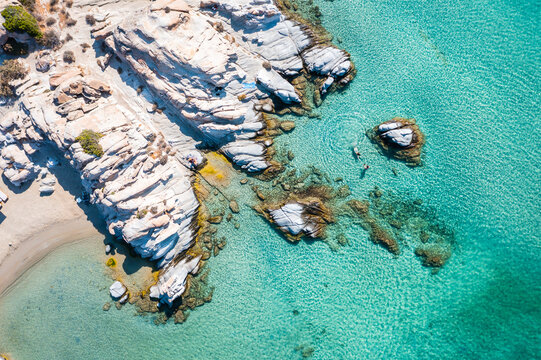 Aerial view of rocky beach and sea, Paros, Greece