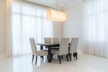Fototapeta premium Spacious and Modern Dining Room with Neutral Tones and Elegant Lighting Design