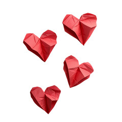 Four red paper hearts float against black. Valentine's, romance