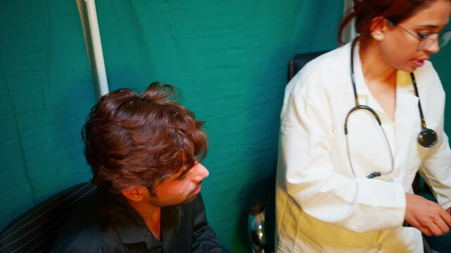 Specialist carefully examine eardrum with auriscope