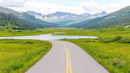 Naklejka premium Winding mountain road leads to valley, scenic view