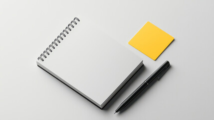 clean and minimalistic workspace featuring blank notebook, pen, and yellow sticky note, perfect for brainstorming ideas or taking notes