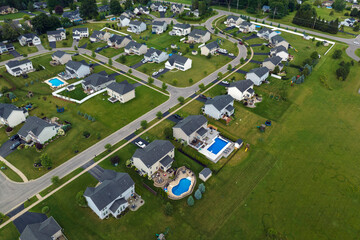 Aerial view of spacious new family houses in upstate New York suburban area. Real estate...