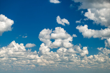 Rain clouds forming on blue Florida sky. Colorful summer skyscape