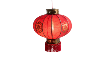 A red lantern with delicate golden patterns and tassels, showcasing a contemporary blend of traditional design and soft lighting. Isolated on a transparent background