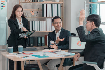 Startup partners, teamwork, people brainstorming and talking casually. Creative startup business meeting to analyze investment strategies and brainstorm sales plans