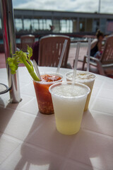 Summer drinks, Margarita clamato and piña colada prepared in a hotel in Baja California MEXICO at sunset by the pool