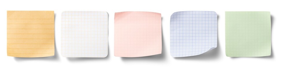 壁に貼り付けたカラフルな付箋メモのテクスチャー