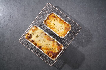 Top View Beef Lasagna on gray surface 