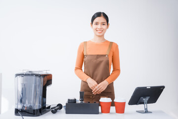 Asian female barista with a beautiful smile, skillfully making coffee in a cozy small shop, creating a warm and welcoming atmosphere for customers in the charming cafe