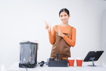 Asian female barista with a beautiful smile, skillfully making coffee in a cozy small shop, creating a warm and welcoming atmosphere for customers in the charming cafe