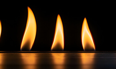 Flame dance in darkness captivating fire display indoor minimalist close-up abstract art for visual impact