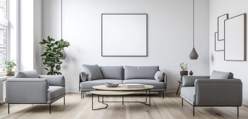 Bright and spacious lounge with grey furniture, light wooden flooring, and a poster.