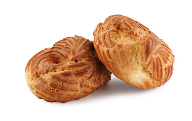 Two eclairs isolated on white background . Profiterole cake on white background . Eclair in the form of a ring .