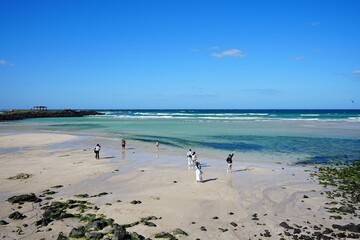 clear shoaling beach and sand bar