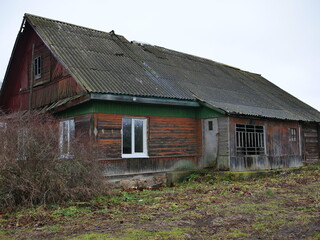 Obraz premium An Abandoned, Neglected, and Deteriorating House Located in a Remote Rural Area, Unseen for Years