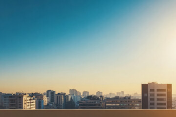 Fototapeta premium Beautiful skyline view of a city during the golden hour with clear blue skies