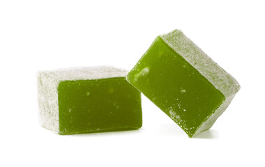 Delicious green candy cubes made from natural flavors, perfect for snacking at any time of the day