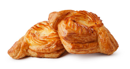 Freshly baked pastries showcasing flaky golden layers ready for enjoyment at a cozy bakery