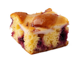 Delicious slice of berry cake featuring a moist texture and a golden-brown top served on a white background