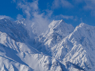 快晴の空と冠雪の北アルプス　長野県白馬村