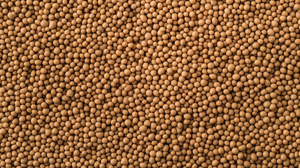 Fototapeta premium Brown Granules Abstract: Close up of a dense cluster of brown granulated particles. The macro shot captures the uniformity and texture of the granular material.