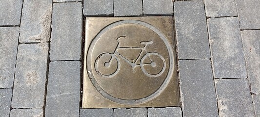 Copper plate with an image of a bicycle